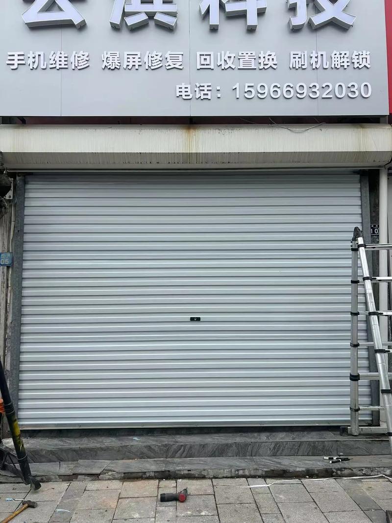 千禧门业 专业安装维修电动车库卷帘门，打造安全便捷之门